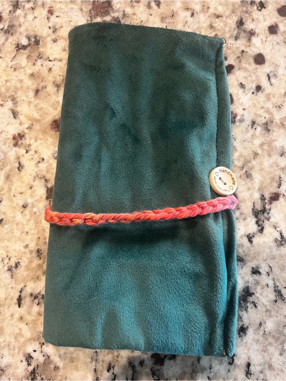 Green Suede-Look Roll with Pink-Orange Braided Tie
